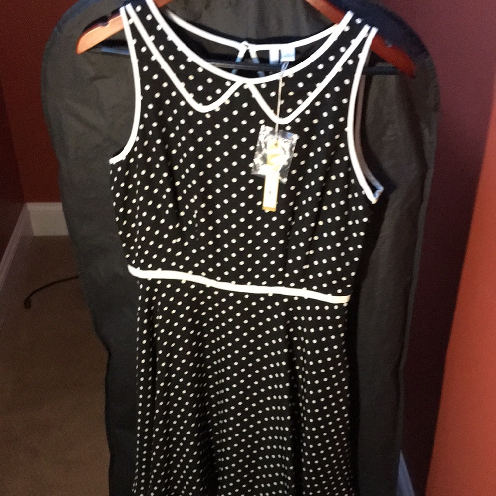 Lauren Conrad- Black and Cream (off white) zippers on the side